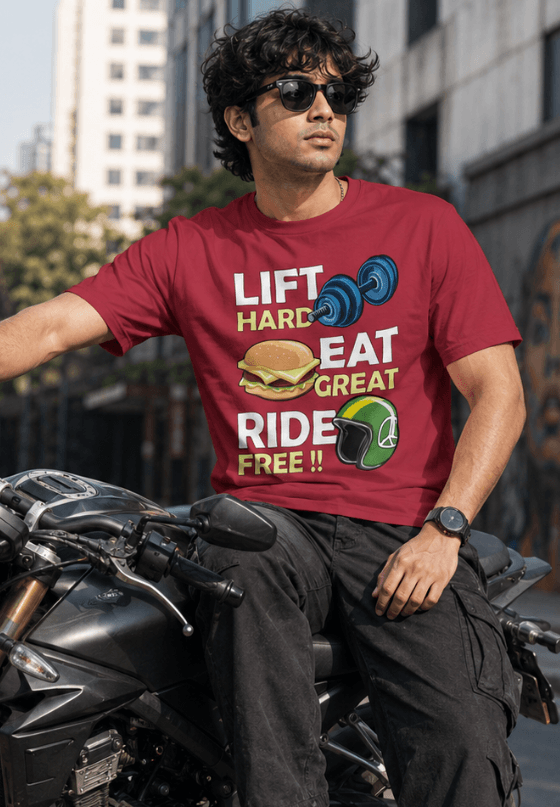 Lift Hard Eat Great Ride Free biker T-shirt artwork with dumbbell, burger and motorcycle helmet graphics, custom T-shirt design by Drop Drip for brands