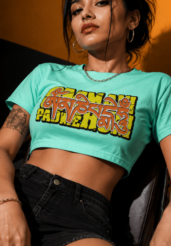 Om Mani Padme Hum mantra T-shirt artwork with bold psychedelic lettering, custom T-shirt design by Drop Drip for brands